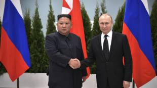 Президентът на Русия Владимир Путин и лидерът на КНДР Ким