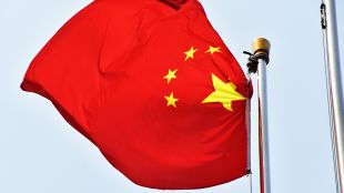 Китай смекчава правителствения контрол върху обменния курс за да може