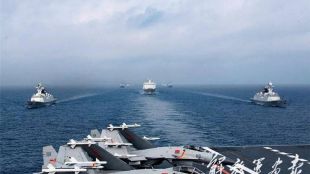 Китай изпрати още военни кораби хеликоптер и изтребител в близост