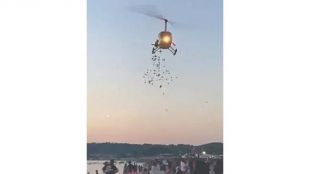 Екшън на Джулая над къмпинг Градина Хеликоптер минава ниско над тополите